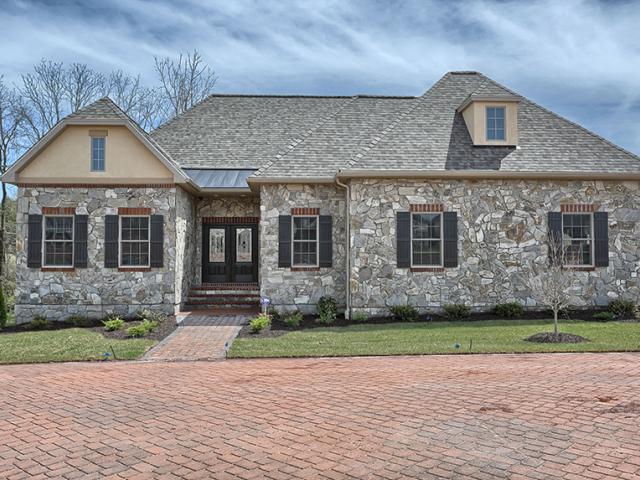 Structural insulated panels (SIPs) form a sturdy structure that offers improved storm resistance, while the hip roof design increases resistance to roof uplift in the event of high winds.