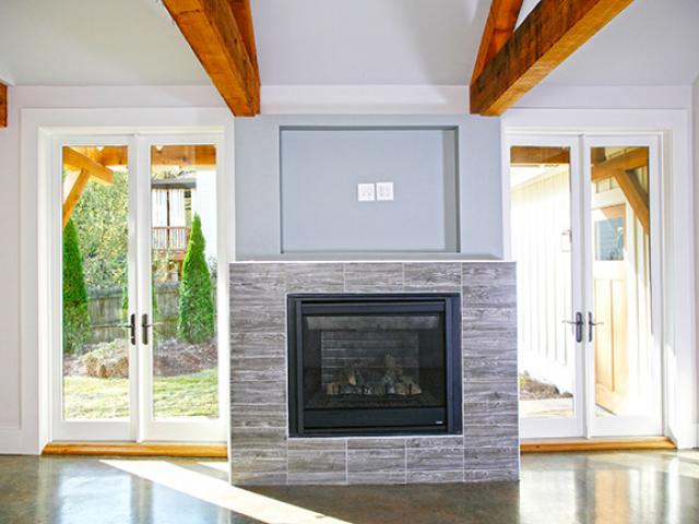 Despite having several doors and windows throughout the home, the high-performance R-32 wall insulation and R-45 attic insulation helped the home achieve a Home Energy Rating System (HERS) score of 41 before photovoltaics were added to bring the score down to a HERS 6.