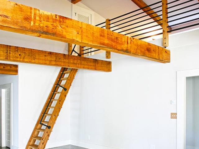 A double layer of insulation over the unvented attic helps keep the loft warm in the winter and cool in the summer.