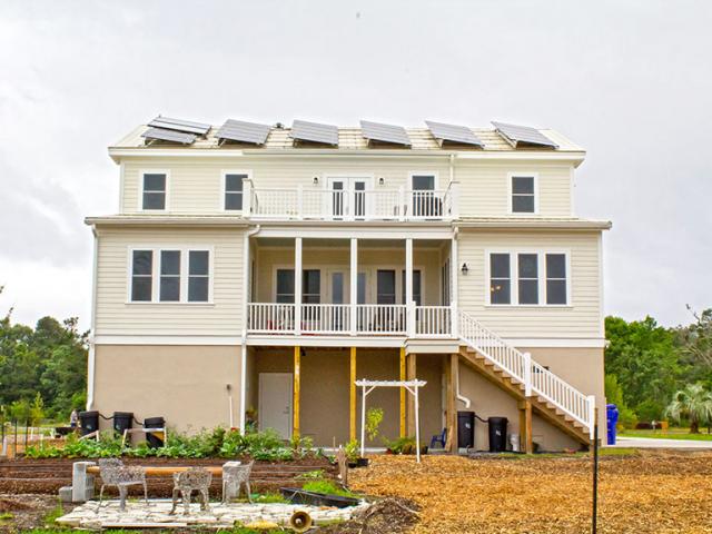 The 6.8 kilowatts of solar photovoltaic panels on the roof contribute $1,200 to the annual energy cost savings of $2,350 this high-performance home is expected to achieve compared to a home built to the 2012 International Energy Conservation Code.