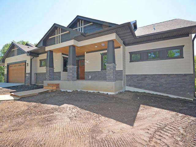 Careful site grading and downspouts direct storm water runoff away from the home.