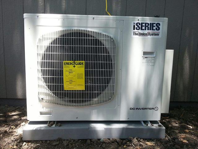 A high-efficiency ductless heat pump provides both heating and cooling. The heat pump has a Heating Season Performance Factor (HPSF) of 9.1 and a cooling efficiency Seasonal Energy Efficiency Ratio (SEER) of 20.