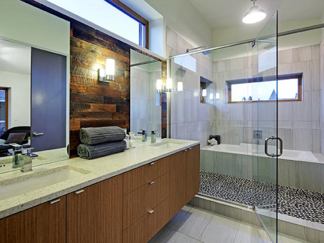 The plumbing includes water-saving fixtures that comply with the U.S. EPA WaterSense program. Hot water is provided by an efficient heat pump water heater that uses 1 kW of energy to generate 4.5 kW of heat, using about 78% less energy than typical gas tank water heaters.