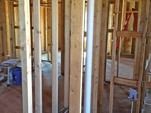 Energy-efficient advanced framing details including insulated corners, insulated headers, and ladder blocking for interior wall intersections create more space for wall insulation and reduce lumber costs.