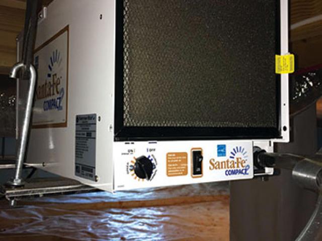 The conditioned crawlspace also houses the ENERGY STAR-rated dehumidifier (pictured here) and an energy recovery ventilator that delivers fresh air throughout the house.