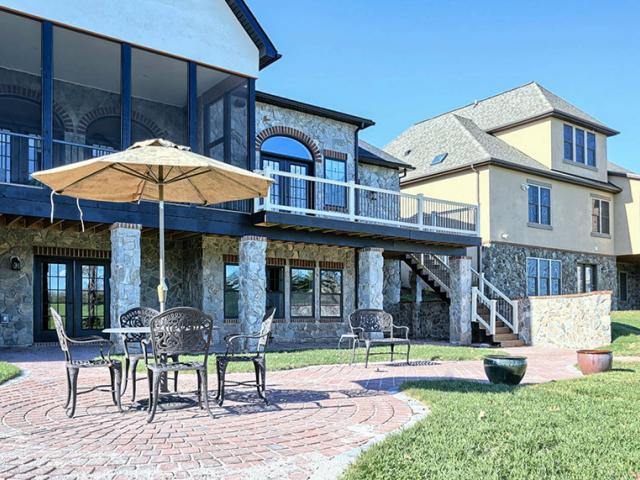The home's daylight-basement is insulated with 2 inches (R-10) of rigid foam under the slab, while a half-inch of rigid EPS separates the concrete foundation walls from the interior stud-framed walls, which are filled with R-15 of batt insulation. The downstairs daylight walls, like the above-grade walls, are made of R-37 structural insulated panels (SIPs), which connect with the other foam layers to form a continual thermal blanket around the home.