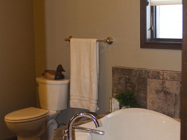 Water-conserving fixtures and short pipe runs reduce water usage and cut the amount of energy needed to heat that water.