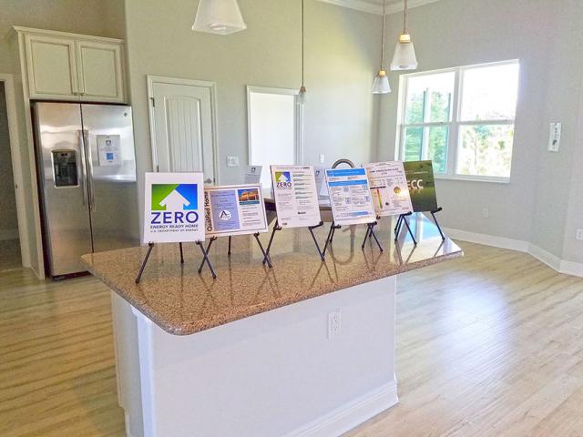The home qualifies for the DOE Zero Energy Ready Home program, the EPA's Indoor airPLUS program, and ENERGY STAR Certified Homes Version 3.1, and achieves the insulation requirements of the 2012 International Energy Conservation Code.