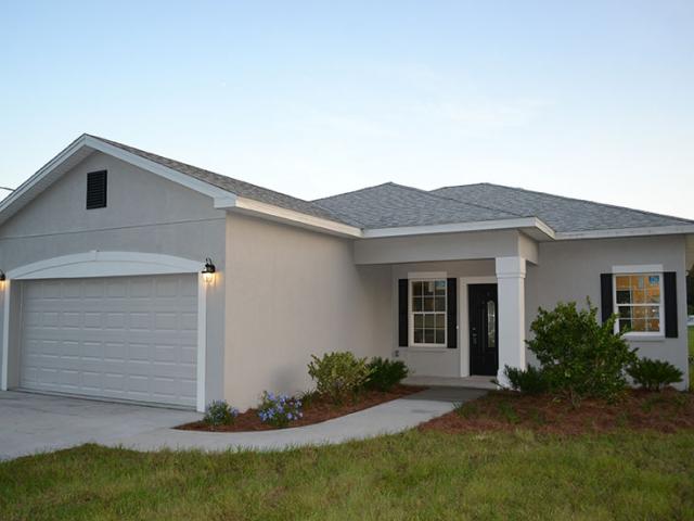 Sunroc Builders constructed this 1,407-square-foot home in Lakeland, Florida, to the performance criteria of the DOE Zero Energy Ready Home (ZERH) program.