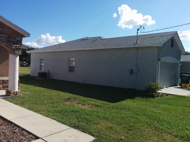 Drought-tolerant plants and grasses require no permanent water sprinkler system.