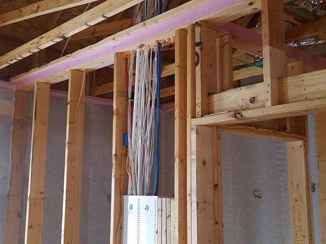 A foam gasket was installed along the top plates before installing drywall as one of several air-sealing steps taken to help achieve a quieter, draft-free home.