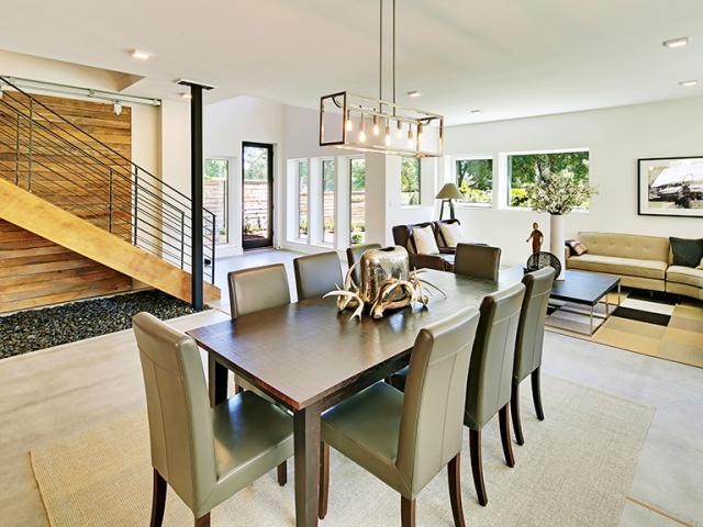 A smart home energy management system communicates with the home’s lighting, HVAC, appliances, solar systems, and even car-charging stations so they can be optimized to work together for increased efficiency.