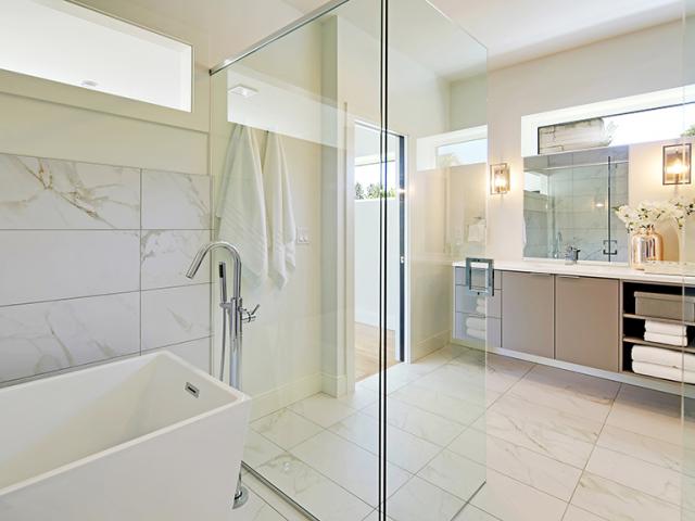 A solar thermal water heating system provides most of the home’s domestic hot water, while EPA WaterSense-labeled fixtures reduce water usage.