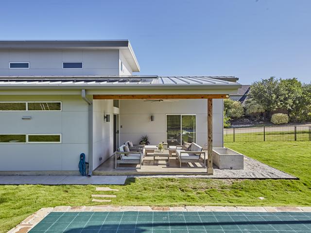 Five inches of spray foam fills the 2-by-6 advanced framed exterior walls, providing insulating, air-sealing, and sound-deadening properties.