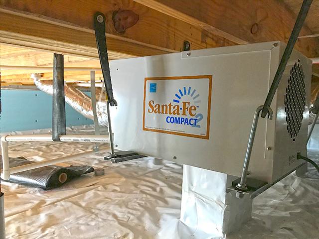 The sealed conditioned crawlspace provides a clean, dry, and temperate environment for the home's supplemental dehumidifier.