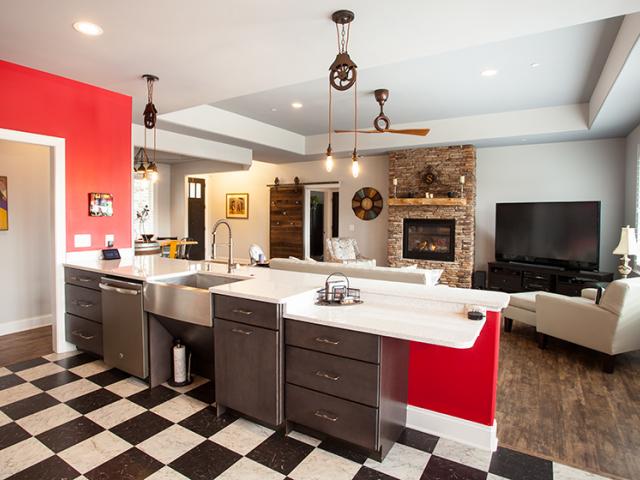 The kitchen features a roll-under sink and countertop design for wheelchair accessibility.