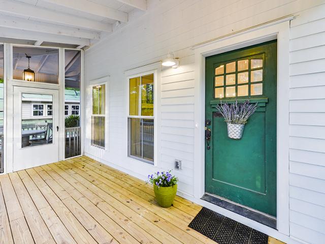 This highly efficient two-story-plus-basement home achieved a low HERS score of 39 even without PV panels with high levels of insulation and air-sealing. The screened front porch offers a naturally cooled spot to gather in mild weather.