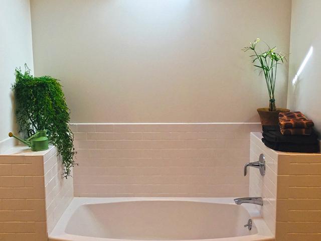 Low-flow and EPA WaterSense-rated fixtures help conserve water while all plumbing pipes are fully insulated to retain heat. A motion sensor-activated recirculation pump speeds hot water to the tap when needed.