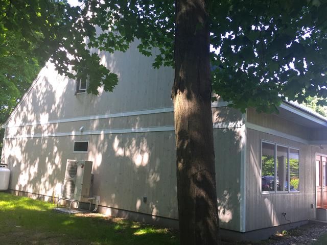 The home is equipped with a high-efficiency, variable-speed, multiducted, minisplit heat pump with a SEER of 15.8 and an EER of 11.3. The ducts are wrapped with insulation and air-sealed with an aerosol sealant process.