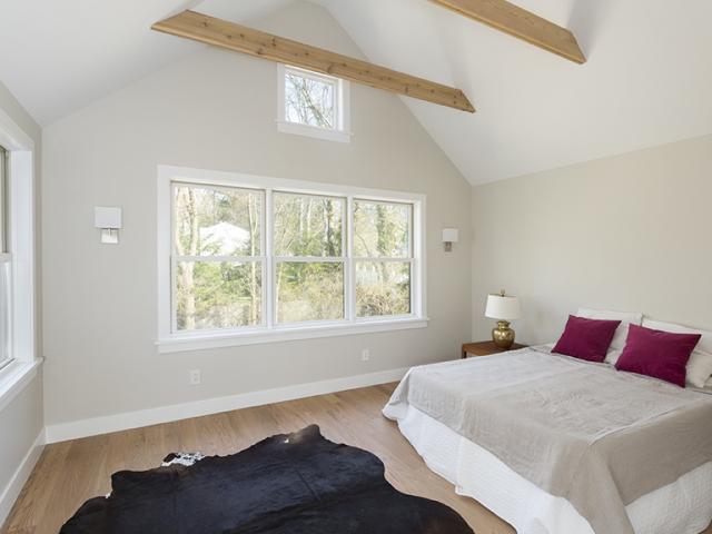 The double-paned, argon-filled, fiberglass- and wood-framed windows have low-emissivity coatings that slow heat transmission but allow in sunlight for daylighting in nearly every room in the house.