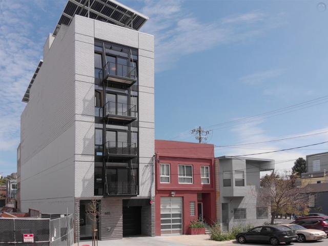 A solar awning over the rooftop deck helped this builder achieve net zero energy on this five-story apartment building in San Francisco.