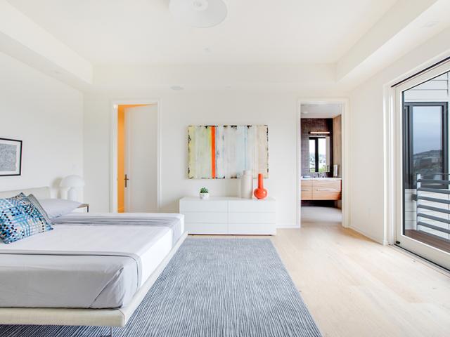 The entire unit is heated and cooled with a single minisplit heat pump that delivers heating and cooling throughout the home via short ducts.