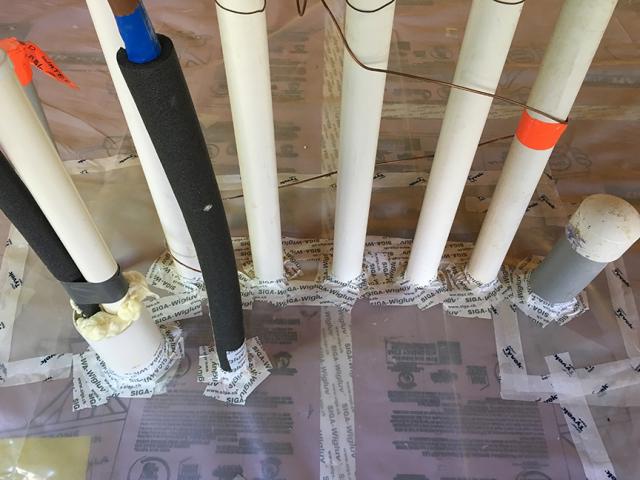 The builder applied extensive air-sealing to every wall, floor, and ceiling penetration and seam using tape, caulk, spray foam, and gaskets.