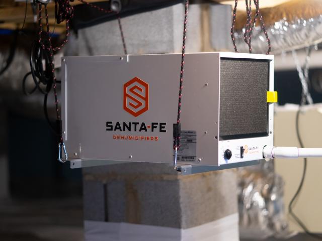 A dehumidifier is located in the sealed crawlspace to keep moisture out of the home.