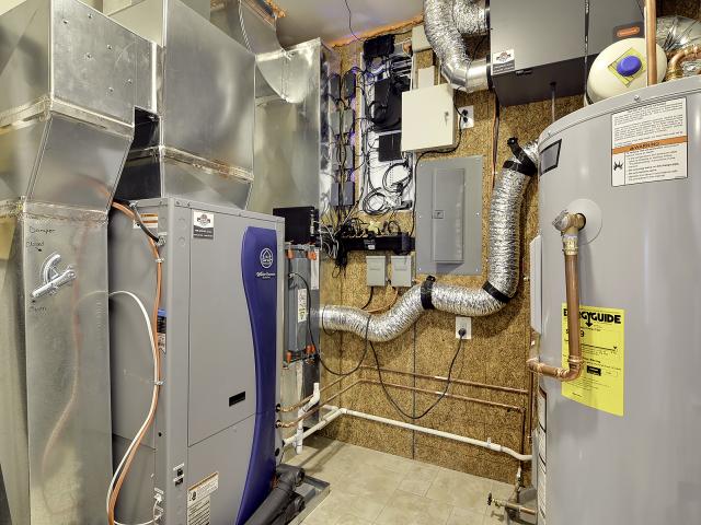 For space and water heating the builder installed a ground-source heat pump with a 4.9 COP with a 19.2 EER and .93 EF. Domestic hot water is provided by a 55-gallon desuperheater fed from the ground source heat pump and a .93 EF electric water heater.
