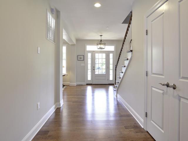 Double-pane vinyl-framed windows bathe the home in natural light. The argon gas fill and two low-emissivity coatings on each window help to reduce heat transfer through the glass.