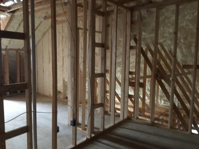 The builder used a combination of open- and closed-cell spray foam to provide a continuous R-56 insulation value around the dormers and other attic structures.