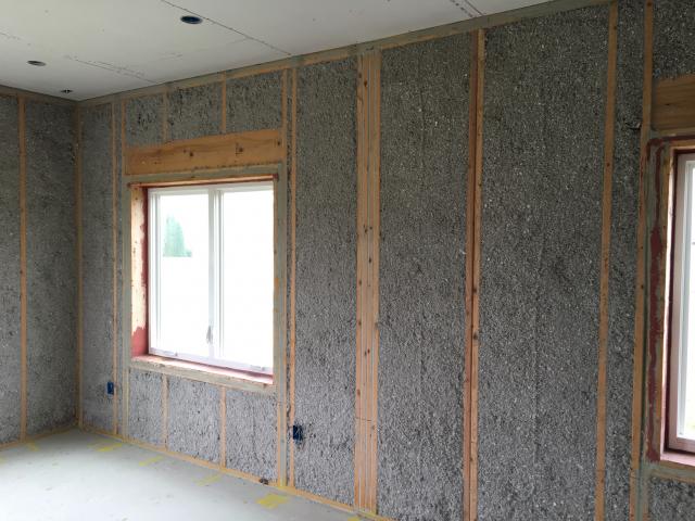The 2-by-6, 24-inch on-center walls were filled with dense-packed cellulose and all joints and seams were caulked or taped to provide draft-free construction.
