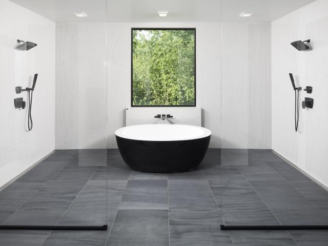 A central manifold plumbing system with PEX piping speeds hot water to each tap with minimal waste while low-flow fixtures further reduce water usage.