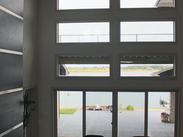 All of the windows are low-e3, which means they have three layers of a very thin, nearly invisible, metal coating on the glass to reflect back radiant heat, helping to keep heat in in the winter and out in the summer.