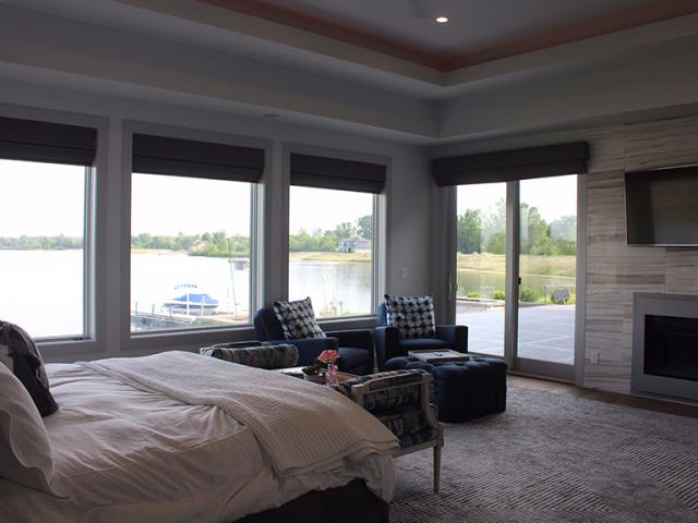 Highly efficient SEER 16 air conditioners keep the home's interior cool while two tankless 95% efficient gas boilers provide hot water for the fan coil system, which distributes heated air throughout the home using high-velocity small diameter ducts.