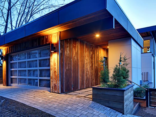 Beneath the reclaimed metal and wood siding the 2-by-6 walls are dense packed with R-23 of fiberglass insulation, and covered with OSB that is protected by a seamless layer of fluid-applied weather barrier.