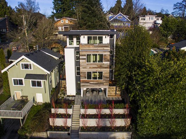 The high-performance triple-pane, low-emissivity windows minimize heat loss while flooding every floor with natural light.