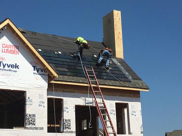 The PV shingles provide a low profile on the roof.