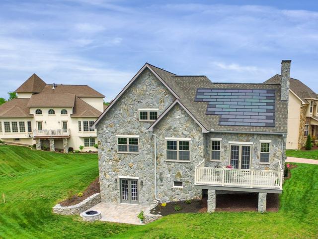The homeowners have utility bills of about $45 a month thanks to the home's super-efficient construction and 4.9-kW of photovoltaic shingles on the roof.