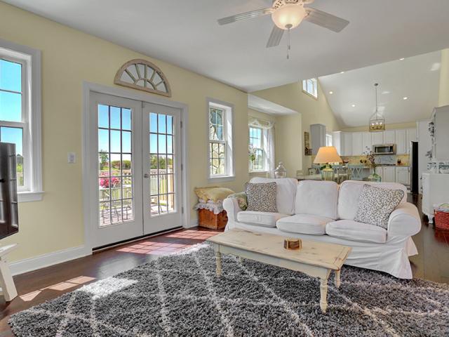 A ground source heat pump provides ultra-efficient (5.6 COP, 20.3 EER) heating and cooling of interior spaces.