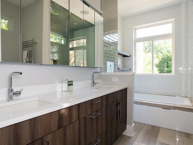 EPA WaterSense fixtures and a compact plumbing design minimize water usage.