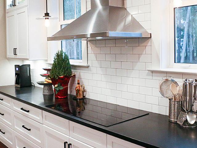 Kitchen and bath exhaust fans provide spot ventilation and are connected to the air handler via an air cycler controller to bring fresh filtered air into the home throughout the day.