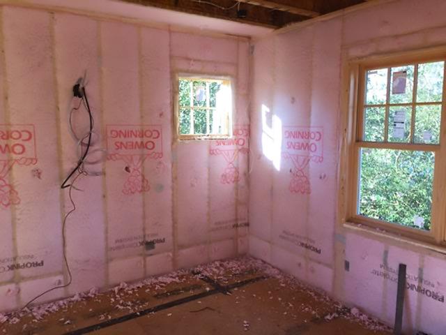 The advance-framed walls are filled with blown fiberglass that completely fills the wall cavities.