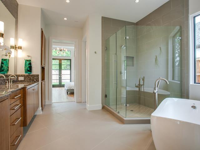 A tankless gas water heater supplies endless hot water to the low-flow faucets.