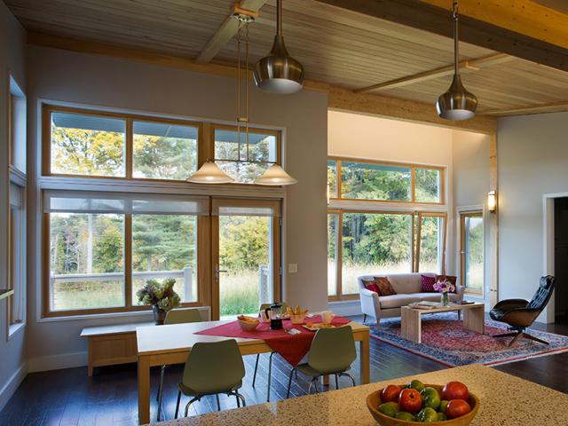 The triple-glazed, low-e2, tilt-and-turn and casement windows (U-0.20, SHGC-0.46) have strong insulating capabilities while letting in significant light for solar heat gain.