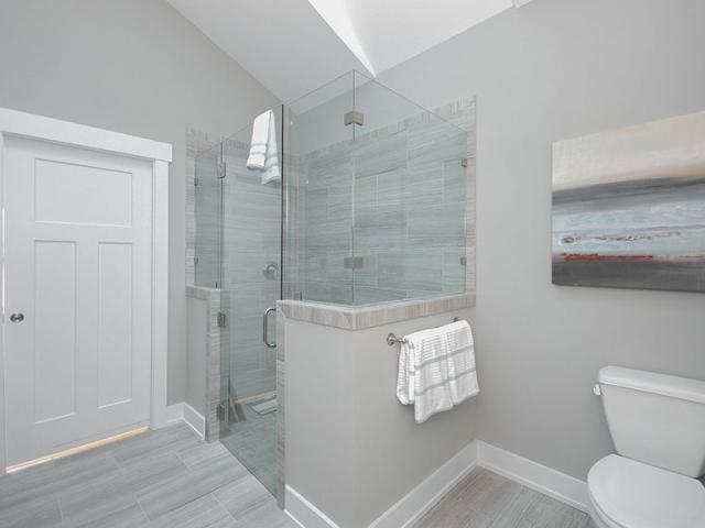 EPA WaterSense-certified low-flow fixtures are used throughout the home to save water and energy. Aging-in-place features include a curbless shower, wide doorways, and solid blocking behind the walls to accommodate future grab bars.