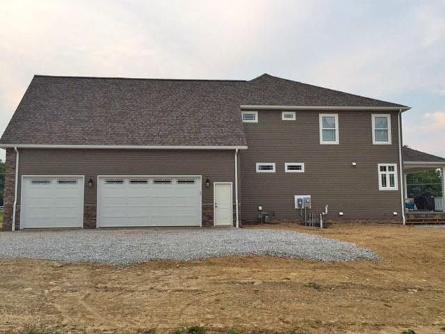 The south-facing roof above the garage was designed for the addition of a solar photovoltaic electric generation system.