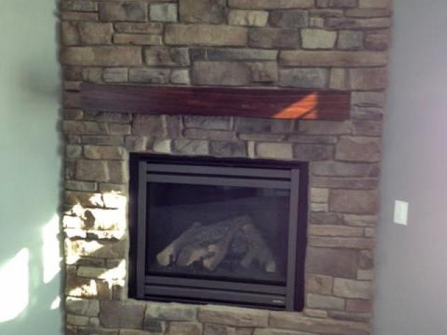 A sealed-combustion fireplace is vented to the outside for the intake of combustion air and the exhaust of combustion gases.