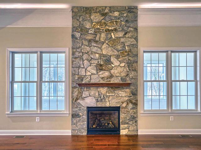 The double-pane windows have insulating gas between the panes and coatings that reflect heat, keeping the inside warmer in winter and cooler in summer.