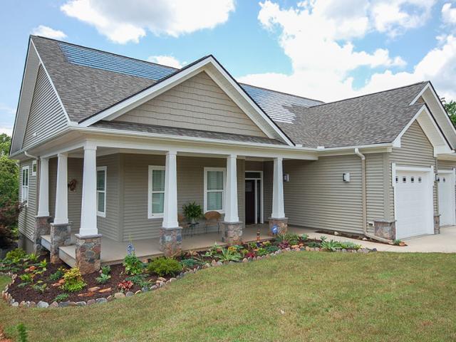 The 7.62-kW solar electric generation system uses roof-integrated photovoltaic shingles for a low profile; the photovoltaics help reduce utility bills by more than $2,000.